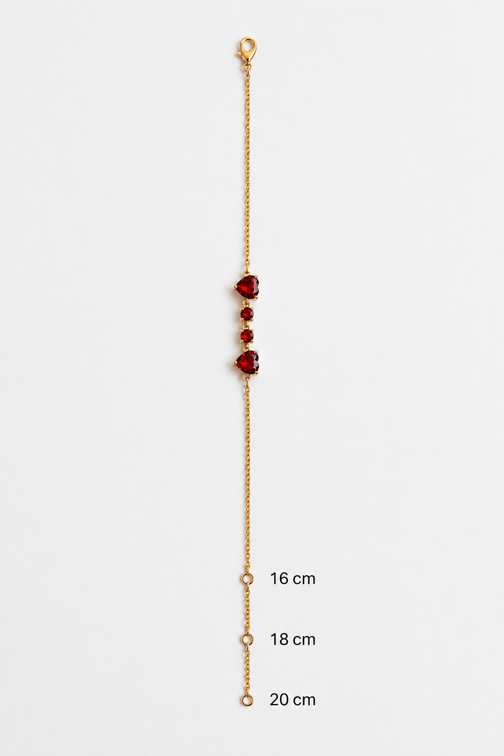 Ophelise solid 10k rose gold bracelet chain with natural red garnet and measurement markers on a white background