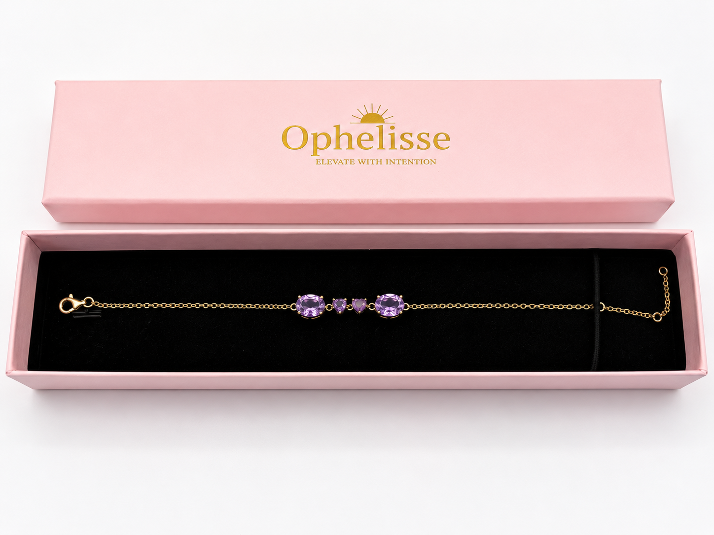 A solid 10k yellow gold chain bracelet with four natural purple amethyst gemstone clusters, presented in an open pink Ophelisse gift box with a black velvet interior.