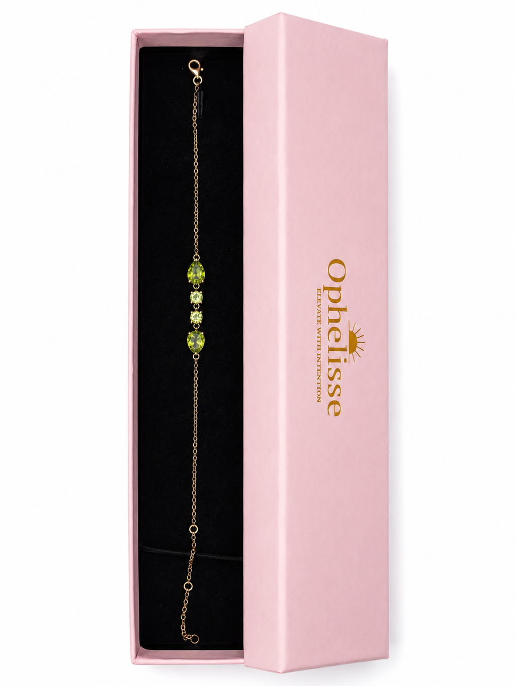 A solid 10k gold chain bracelet with natural green peridot gemstone, presented inside a pink Ophelisse gift box with a black interior.